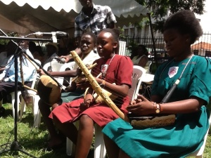 Pupils from Gayaza high school play the Adungu, a local musical instrument
